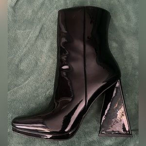 Dolls Kill size 7 black boots with triangular heel
